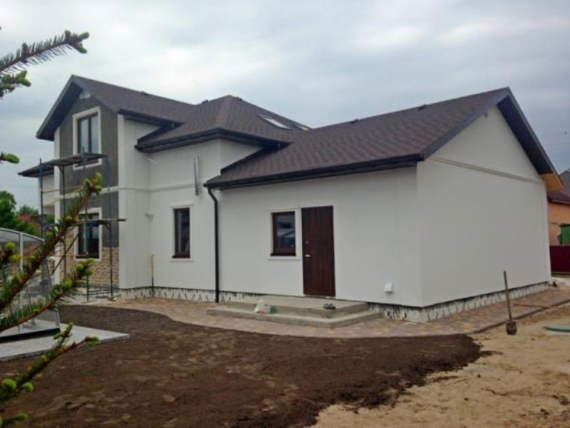 15.05.2015 года. Заканчиваются фасадные и внутренние отделочные работы энергоэффективного дома от Бауен Хаус